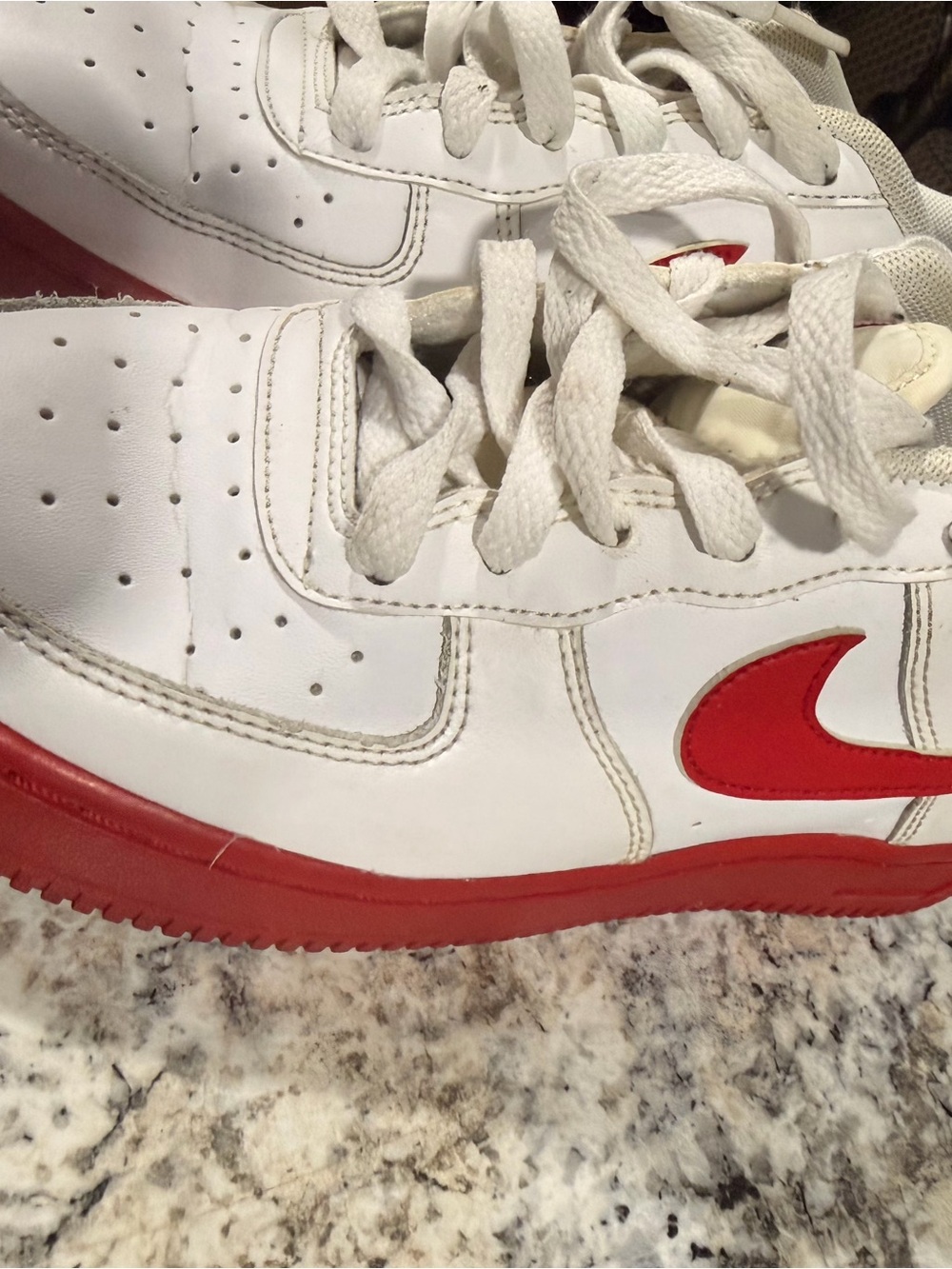 Nike Kids White and Red Low-Top Sneakers with Red Swoosh